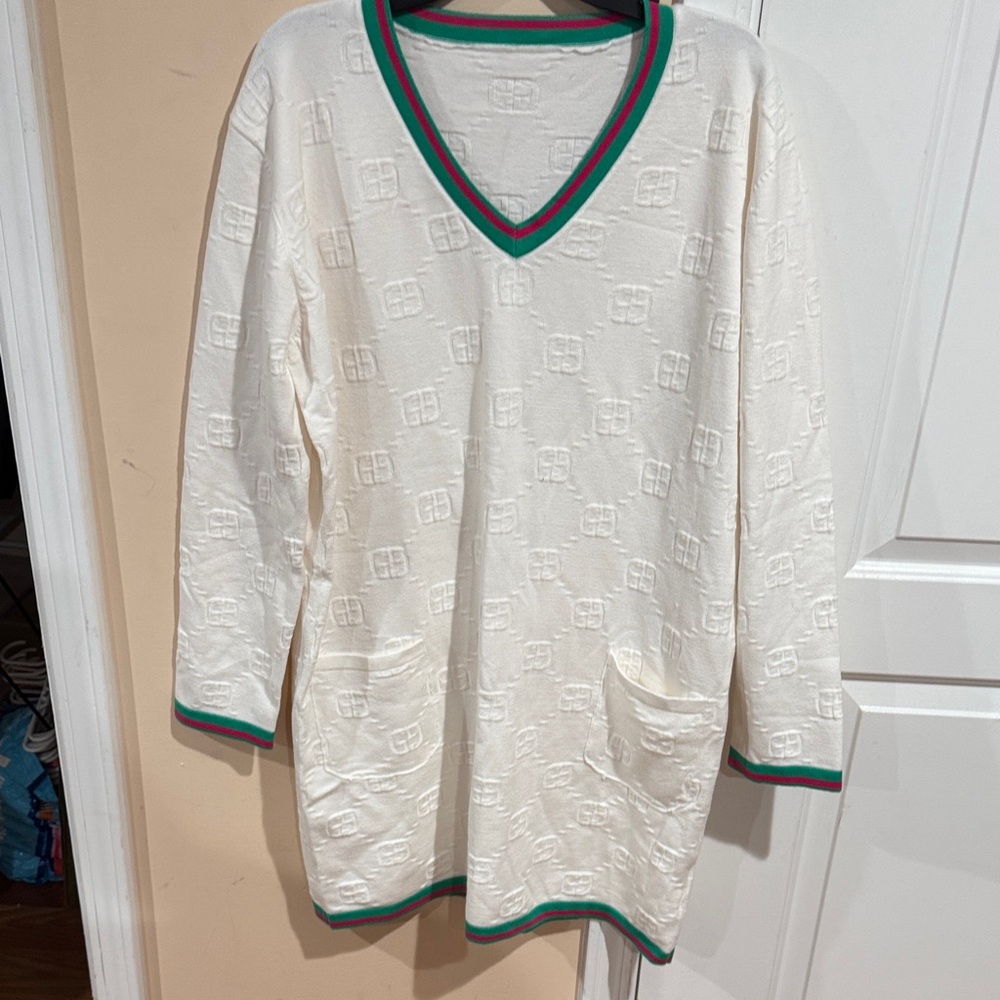 Elegant White V-Neck Dress with Green and Red Trim